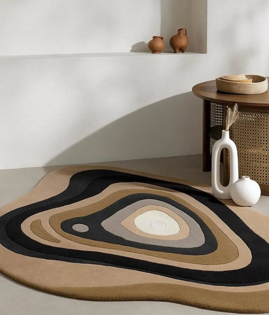 Haven camel and charcoal contour hand tufted wool rug in a styled living room